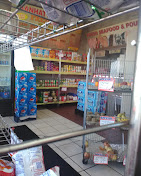Token grocery display shelf inside Manhattan Fish & Chicken Market